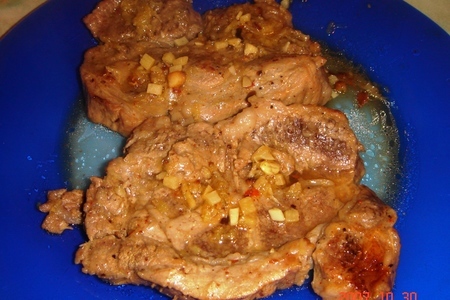 Фото к рецепту: Свинина в коньячном соусе с медом и имбирем
