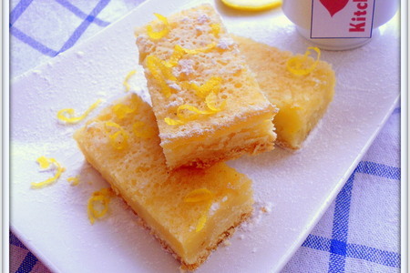 Фото к рецепту: Нежный лимонный пирог. лимонные ломтики.