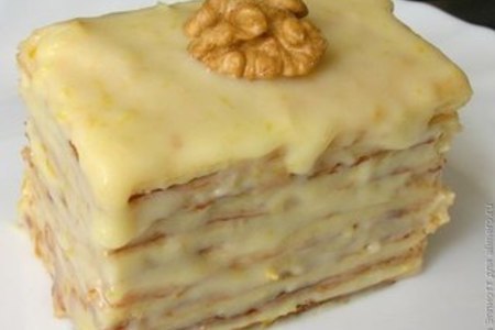 Фото к рецепту: Слоеное пирожное со сгущенкой