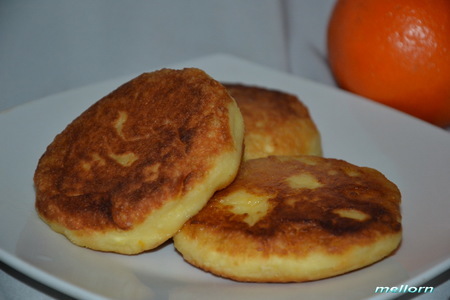 Фото к рецепту: Сырники апельсиновые