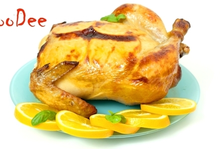 Фото к рецепту: Праздничная курица с апельсинами в духовке