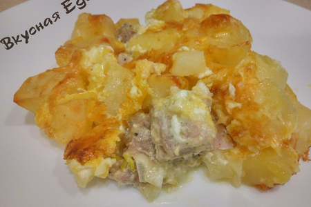 Фото к рецепту: Картошка с мясом в духовке