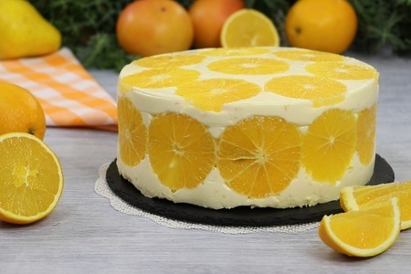Фото к рецепту: Муссовый торт "апельсин с апельсином в апельсине"
