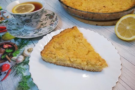 Фото к рецепту: Песочный пирог с лимоном и апельсином