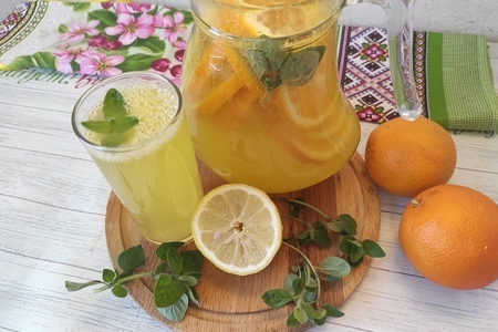 Фото к рецепту: Домашний лимонад из апельсинов и лимонов