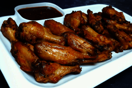 Фото к рецепту: Куриные крылышки с кисло-сладким соусом