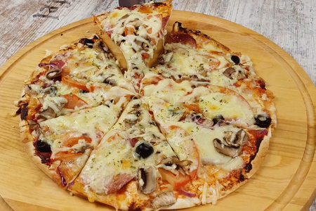 Фото к рецепту: Пицца на основе из лаваша