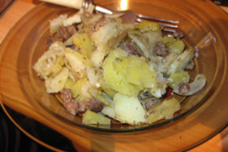 Фото к рецепту: Картофель запеченный с фаршем