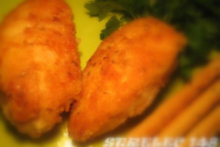 Фото к рецепту: Куриное филе в крошках с тмином и в пармезане.