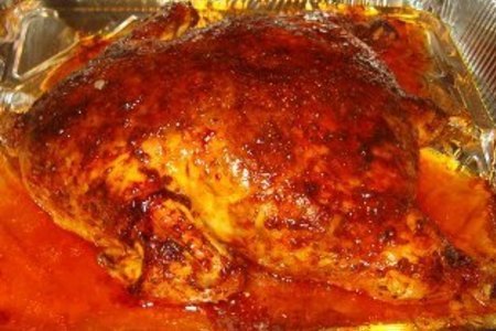 Фото к рецепту: Фаршированная курица без костей.