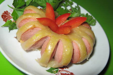 Фото к рецепту: "хризантема"из сосиски