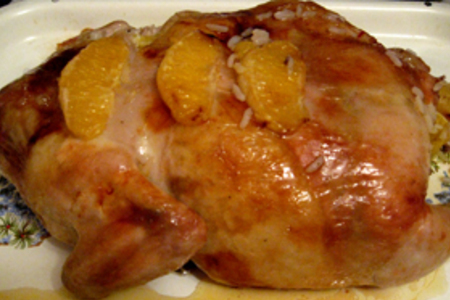 Фото к рецепту: Курица без костей фаршированная апельсинами