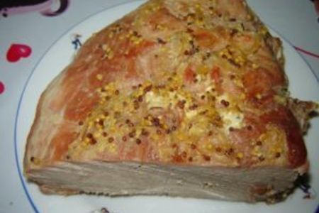 Фото к рецепту: Свиной окорок запеченный в духовке