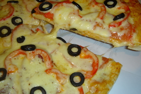 Фото к рецепту: Тесто на пиццу без яиц и масла