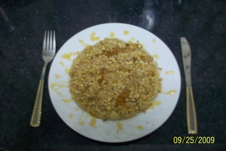 Фото к рецепту: Куакер с грецкими орехами и мёдом.
