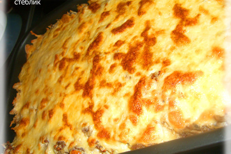 Фото к рецепту: Запеканочка рисовая с курятинкой и сыром:)