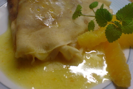 Фото к рецепту: Бретонские сладкие блинчики со сливочно-апельсиновым кремом