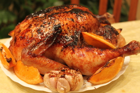 Фото к рецепту: Курица с апельсинами, медом и специями