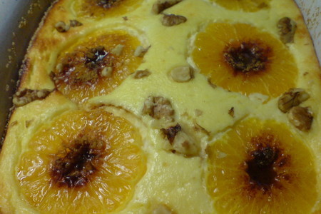 Фото к рецепту: Творожная запеканка "герберы" с мандаринами,орехами и корицей