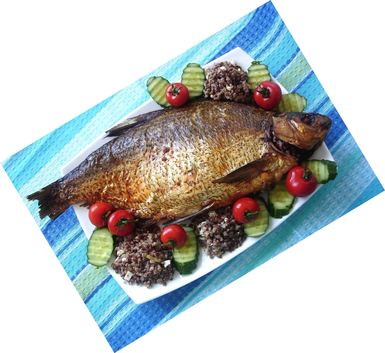 Рецепт 2. Рыба, фаршированная гречкой и запеченная в духовке с картофелем