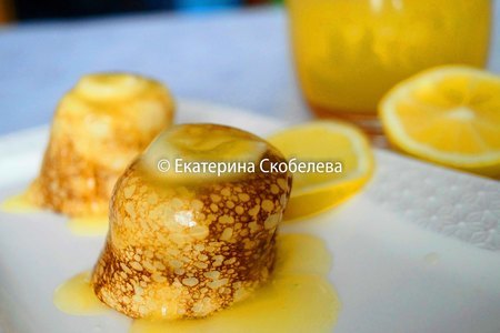 Фото к рецепту: Тонкие блинчики с апельсиново-лимонным соусом